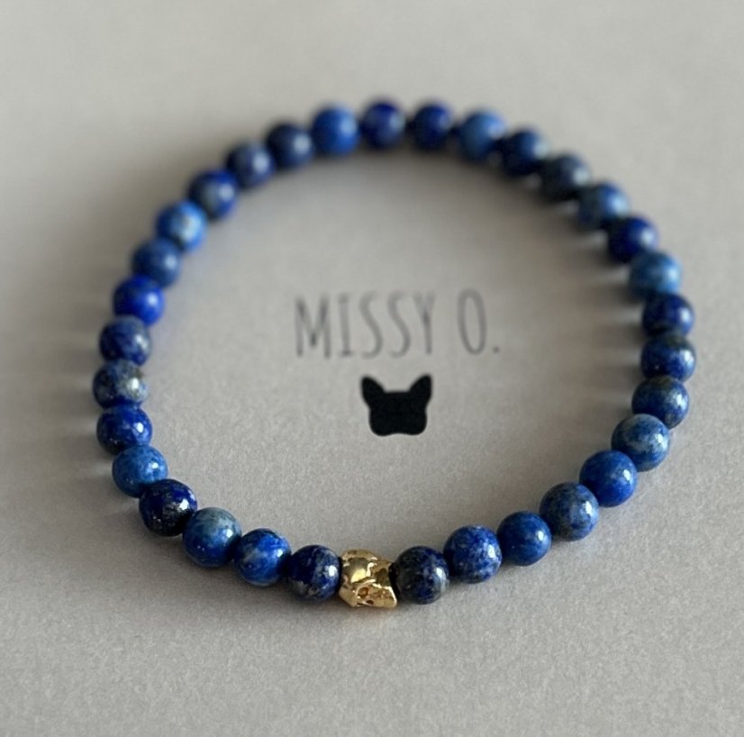 Lapis lazuli se zlatou lebkou